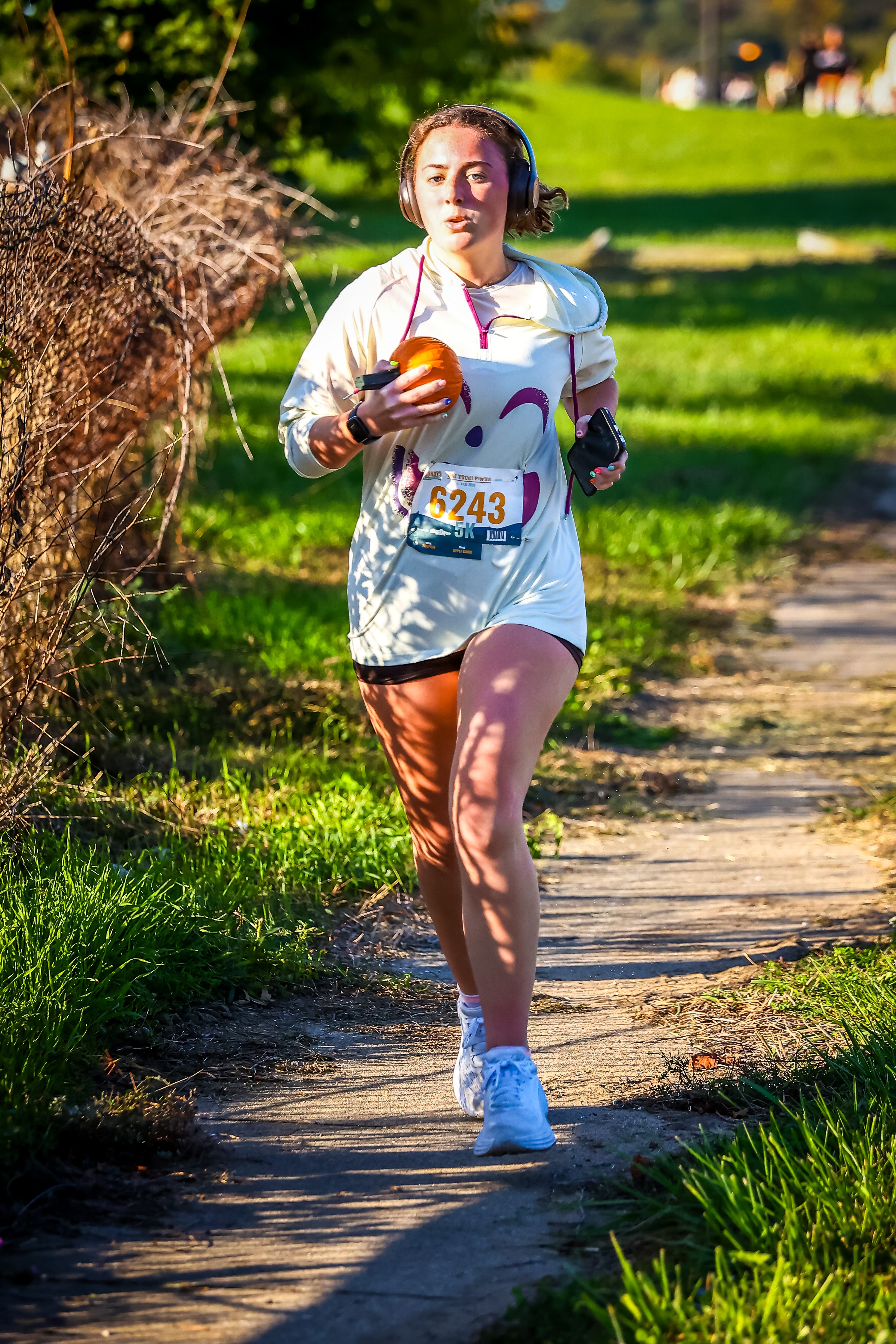 Runner on a path with a scenic background